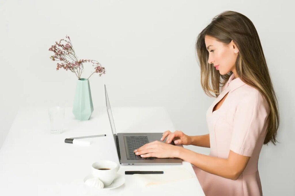 How To Find The Best Last Minute Cruise Deals In 2024 woman sitting while using laptop